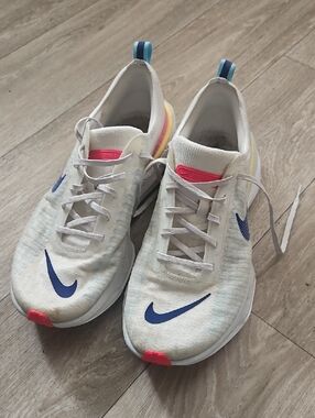 Nike Cream Knit Sneakers with Blue and Pink Accents